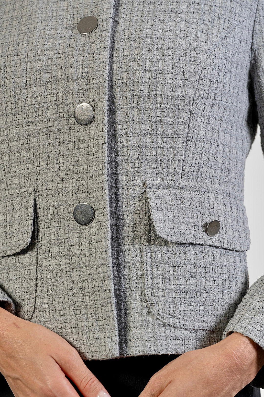 Darina collarless jacket in grey bouclé by Sofia Lara — button and pocket detail
