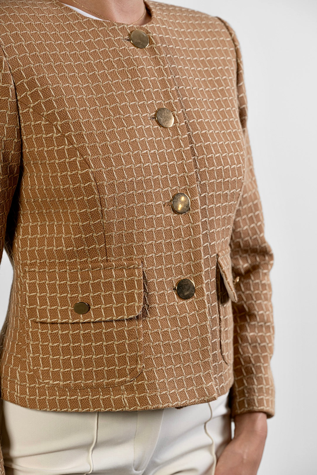 Mona collarless jacket in camel textured cotton by Sofia Lara — front detail, buttons and pockets