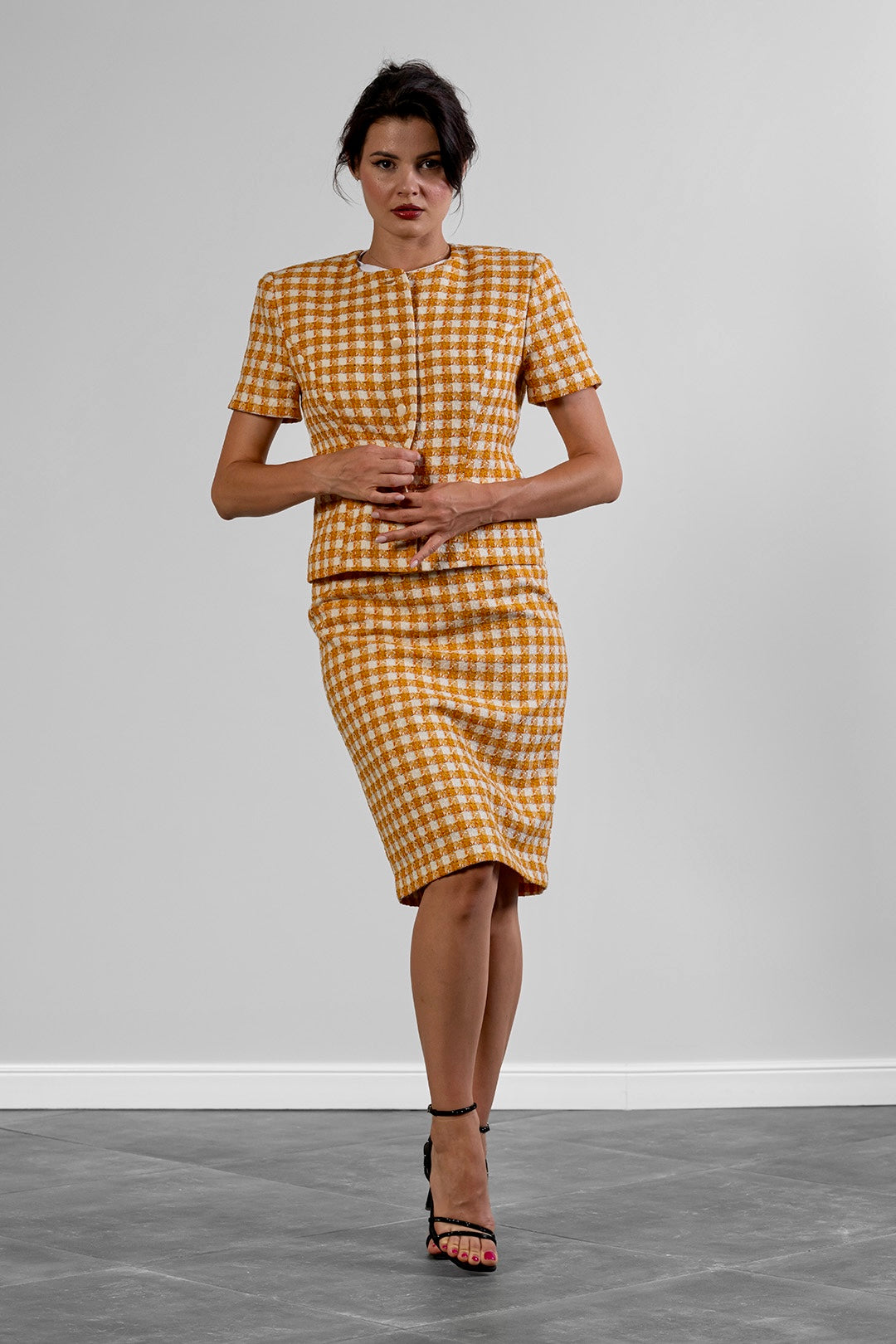 Niya short-sleeve top and pencil skirt set in ochre check cotton tweed by Sofia Lara — front view