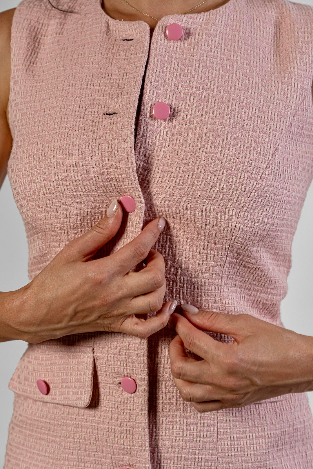 Nora sleeveless button-front dress in blush dobby cotton by Sofia Lara — fabric detail