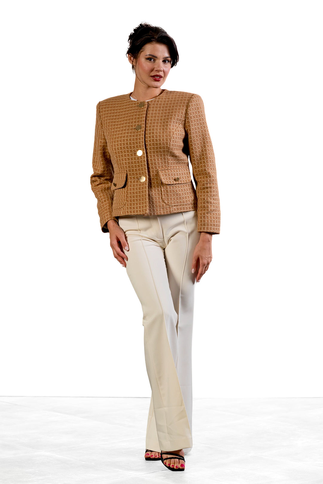 Reni flared trousers in cream by Sofia Lara — full-length front view, worn with the Mona jacket