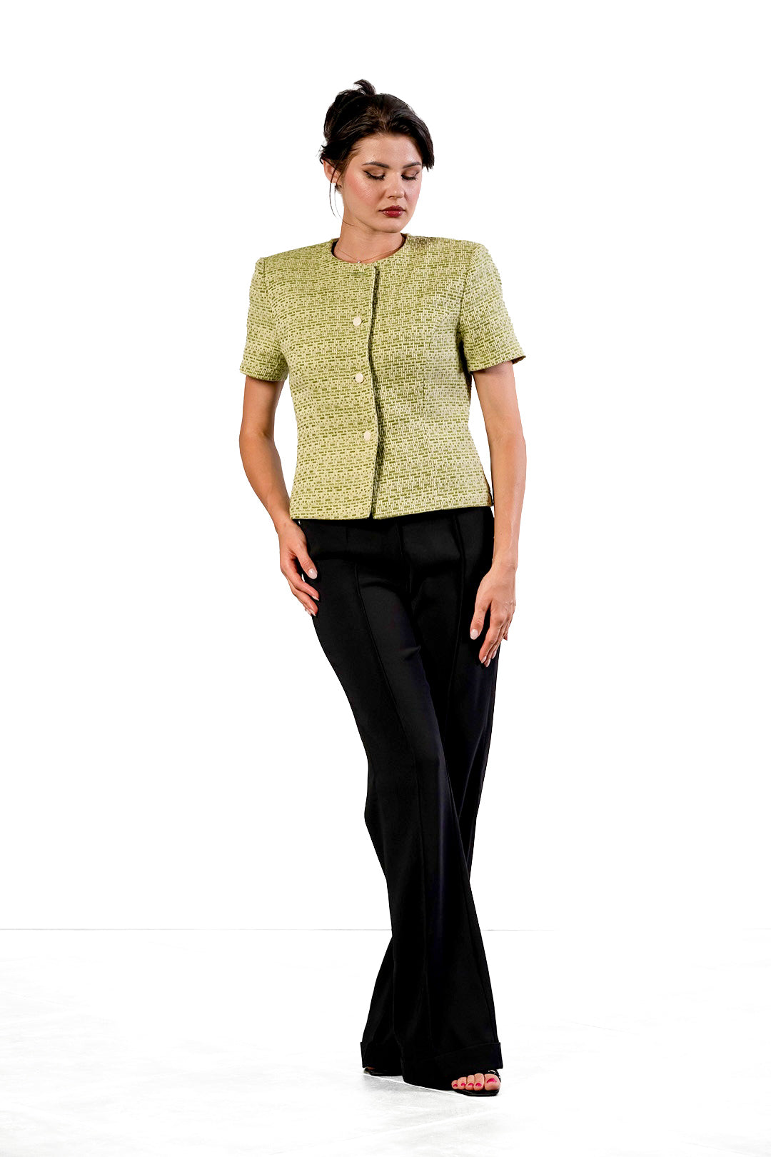 Toni flared trousers in black by Sofia Lara — front view, worn with the Neli jacket